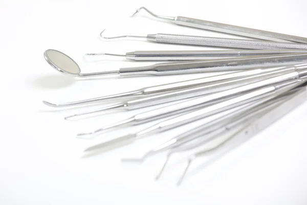 Set of metal medical equipment tools for teeth dental care — Stock Photo, Image