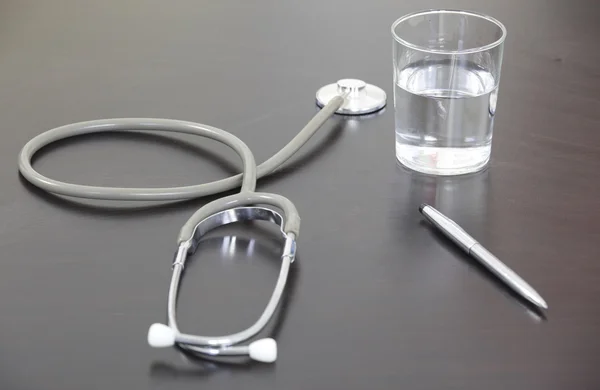 Stethoscope and water — Stock Photo, Image