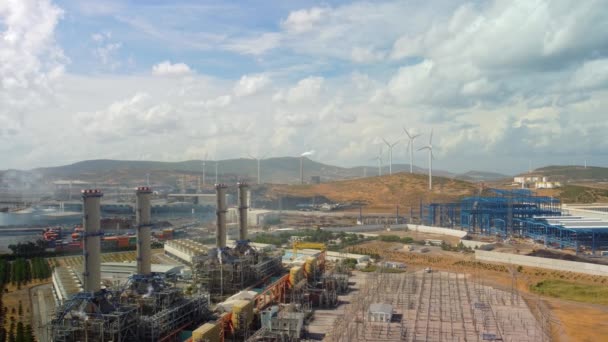 Aerial view of large industrial gas power plant in countryside. Top view. Complex with pipelines and chimneys — Stock Video