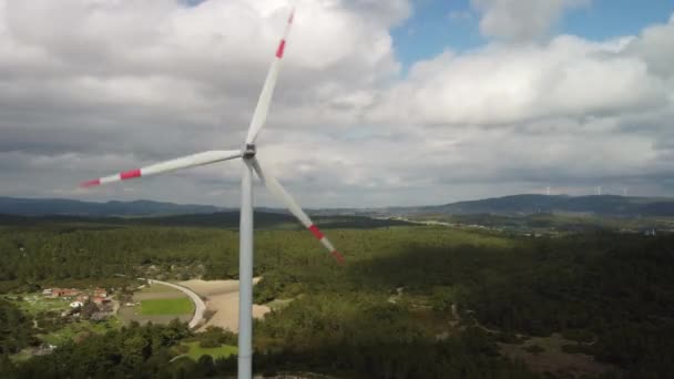 Aerial view over the farm landscape and wind turbines generating clean renewable energy. Renewable energy production for the green ecological world. — Stock Video