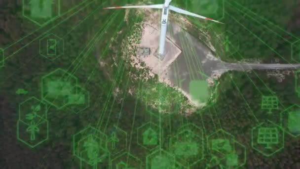 Vista aérea de molinos de viento con visualización holográfica de datos de tecnología de visualización generada digitalmente. Turbinas eólicas generadoras de energía renovable limpia para el desarrollo sostenible de manera ecológica — Vídeo de stock