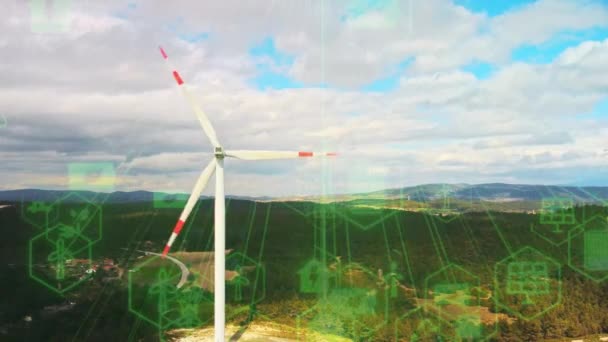 Aerial view of windmills with digitally generated holographic display tech data visualization. Wind power turbines generating clean renewable energy for sustainable development in a green ecologic way — Stock Video