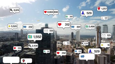 Social media icons fly over city downtown showing people engagement connection through social network application platform . Concept for online community and social media marketing strategy . High
