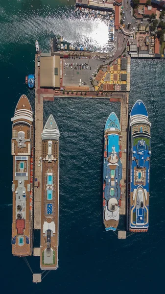Aerial view of giant cruise ships moored in the port . High quality photo