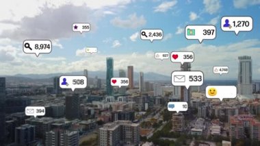 Social media icons fly over city downtown showing people engagement connection through social network application platform . Concept for online community and social media marketing strategy . High