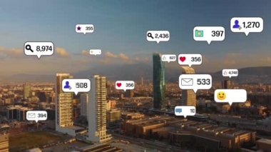 Social media icons fly over city downtown showing people engagement connection through social network application platform . Concept for online community and social media marketing strategy . High