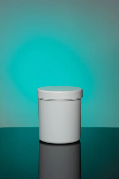 White Cosmetic Jar Mokup Reflection Cyan Background Spot Light Background — Stock Fotó