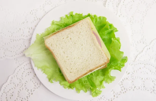 American fresh home sandwich with salami, cheese, salad and tomatoes — Stock Photo, Image