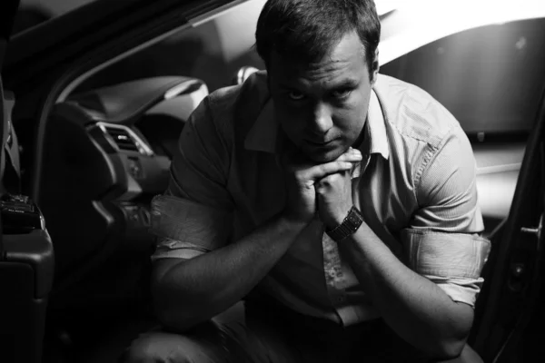 Portrait of man sitting on drivers seat — Stock Photo, Image