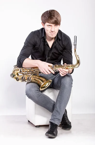 Man posing with saxophone — Stock Photo, Image