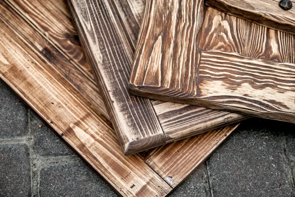 Fotografía de cerca de tres tableros de madera tonificados — Foto de Stock