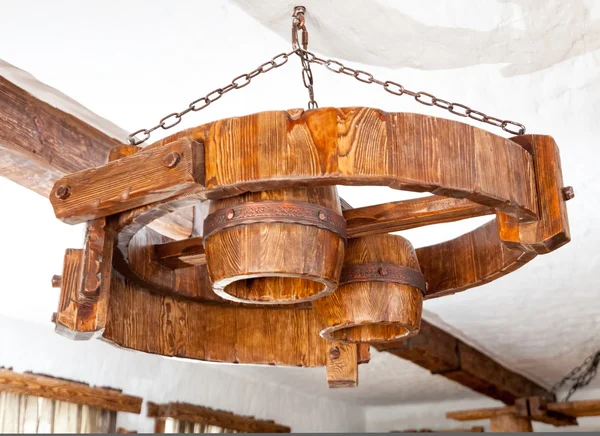 Big round lamp hanging on chains — Stock Photo, Image