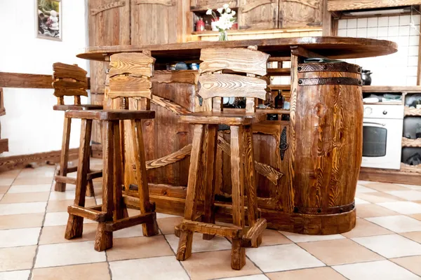 High wooden bar chairs standing near bar desk Stock Picture