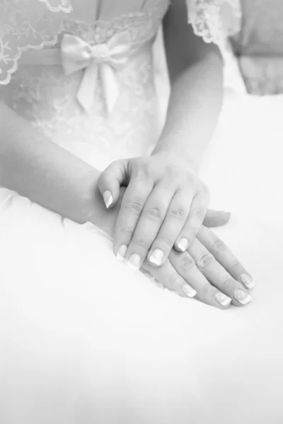 Sexy bride holding hand on hand — Stock Photo, Image