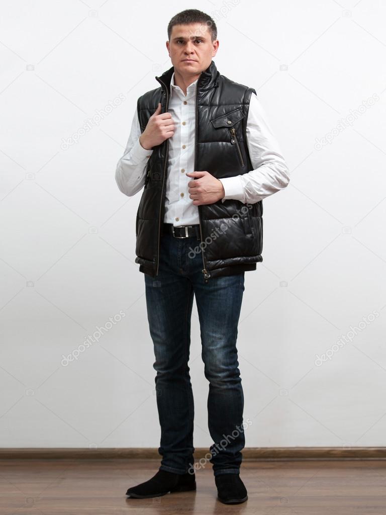 Elegant man wearing vest from natural leather