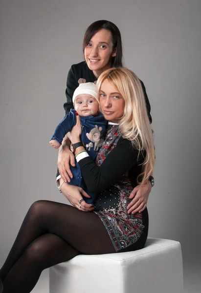 Blonde mother with little and adult daughter — Stock Photo, Image