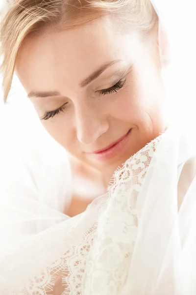 Portrait of cute smiling bride with closed eyes — Stock Photo, Image