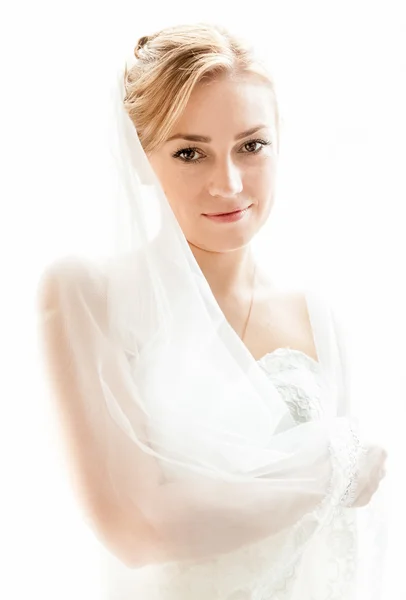 Middle aged bride in white dress with long veil — Stock Photo, Image