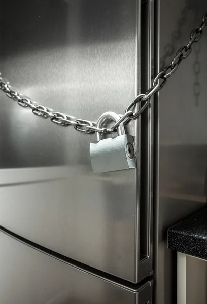 Photo of metal chain on fridge — Stock Photo, Image