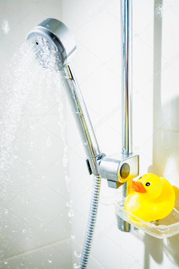  rubber duck at shower with floating water