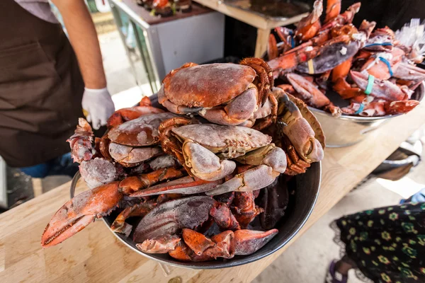 Frozen crabs and lobster claws at restaurant kitchen — Stock Photo, Image