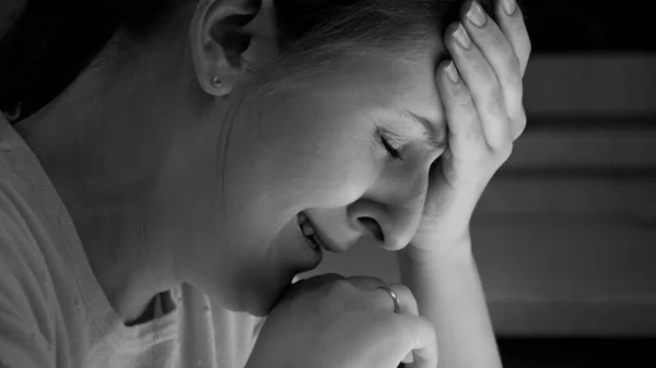 Black and white portrait of stressed crying woman lonely at night — Stock Photo, Image