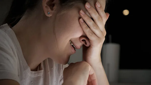 Portrait of sad woman feeling lonely crying at night because of depression and loneliness — Stock Photo, Image