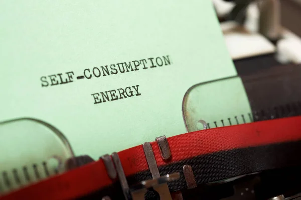 タイプライターで書かれた自己消費エネルギーテキスト — ストック写真