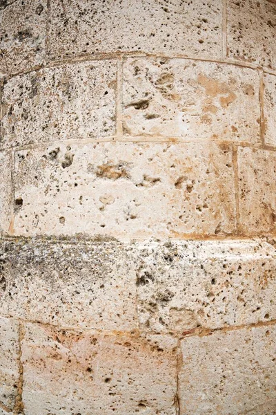 Medieval stone wall background in El Burgo de Osma, Soria Province, Castilla Leon in Spain.