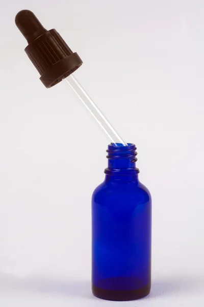 Glass bottle of Essential oils — Stock Photo, Image