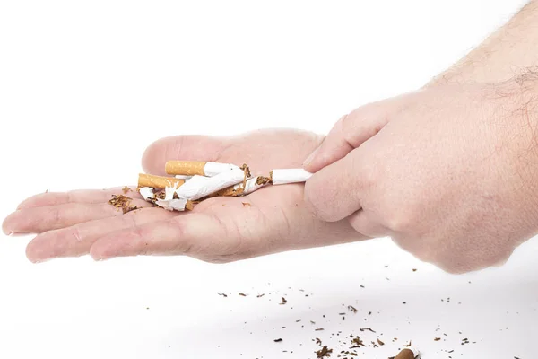 Human Hand Man Her Hair She Breaks Cigarettes Pours Them — Stock Photo, Image