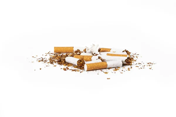 Few Cigarettes Damaged Poured Surface White Background Close — Stock Photo, Image