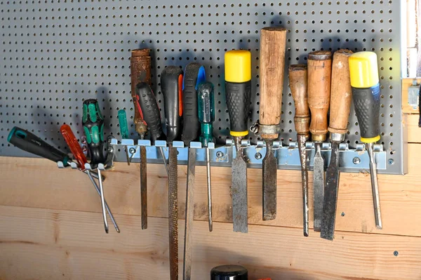 Tool board with chisels and screwdrivers in workshop — Stock Photo, Image