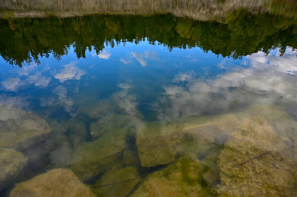 calm water surface in old Swedish quarry Kumla Sweden september 18 2022