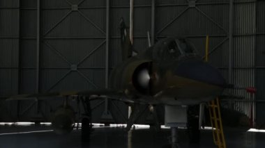 Uçak Hangarı 'nın Kapısı' nın açılışı bir savaş jetinin tutulduğu, Hangar 'da savaş uçağı, Hangar' da Dassault Mirage III C serisi, Hangar 'da avcı uçağı, Hangar' da savaş uçağı. 