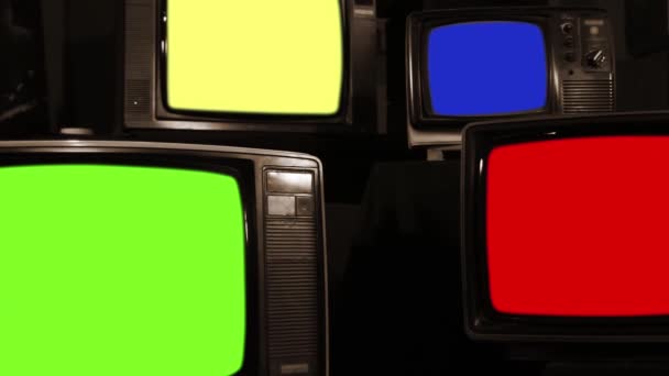 Four Old Televisions Turning Different Chroma Key Screens Zoom Out — Stock Video