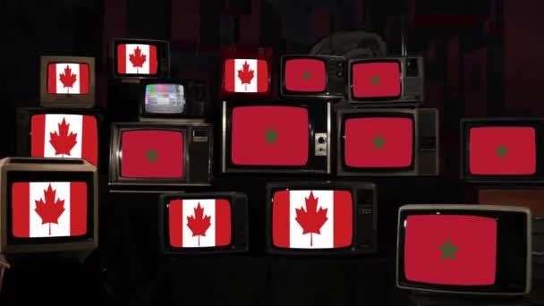 Flaggen Von Kanada Und Marokko Auf Vintage Fernsehern Auflösung — Stockvideo