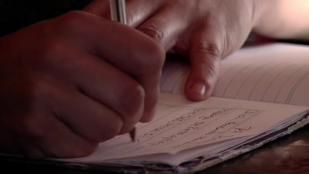 Man Writing Notes Notebook Pen Close — Video