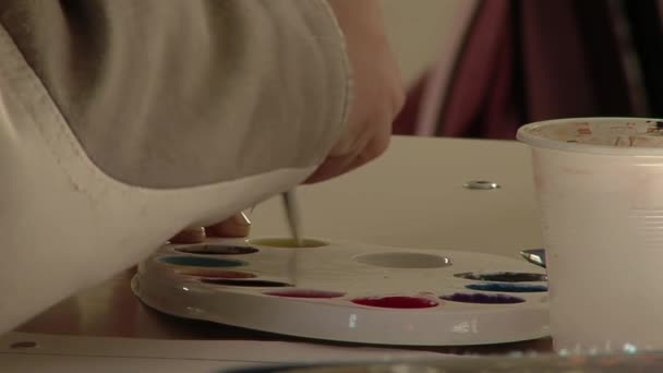 Young Kid Painting Paintbrush Colorful Paints Close — Vídeo de Stock