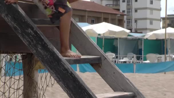 Legs Young Kid Walking Wooden Stairs Lifeguard Tower Beach Close — Stockvideo