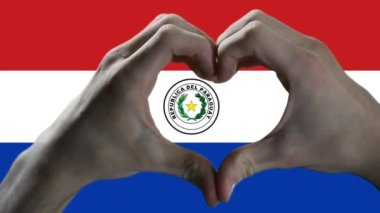Hands showing Heart Sign over Paraguay Flag.  