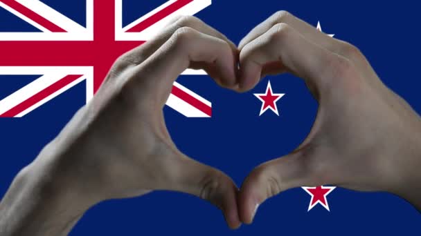 Mâinile Arată Semnul Inimii Peste Steagul Noii Zeelande — Videoclip de stoc