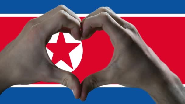 Hands Showing Heart Sign North Korea Flag — ストック動画