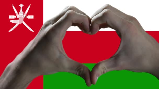 Hands Showing Heart Sign Oman Flag — стоковое видео