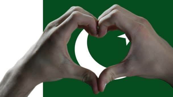 Pakistan Bayrağı Üzerinde Kalp Şareti Gösteren Eller — Stok video