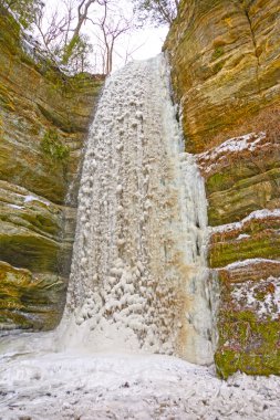 Frozen Waterfall in a Remote Canyon clipart