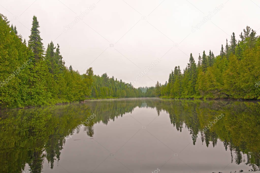 Calm Waters on a Misty Lake on Cliff Lake in the Boundary Waters in Minnesota