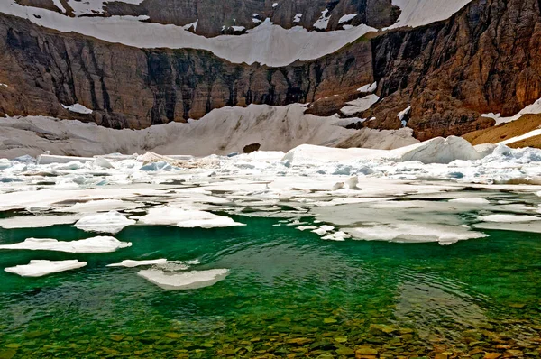 Icy Waters on an Alpine Lake on Iceberg Lake in Glacier National Park in Montana