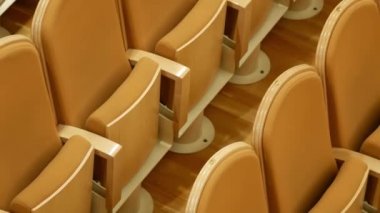 Empty vip seats in concert hall, conservatory, theater. Nobody. Velvet armchairs