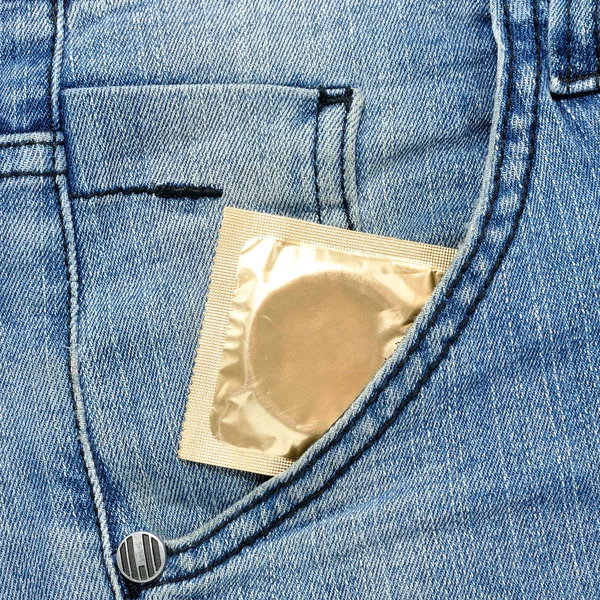 Condom on a white background — Stock Photo, Image